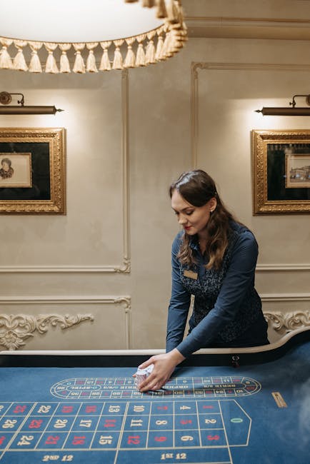Professional dealer explaining game rules to guests at an exclusive casino event